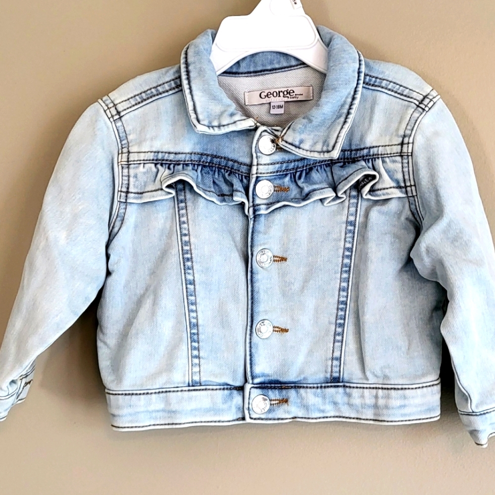 Light wash snap closure denim jacket with ruffles